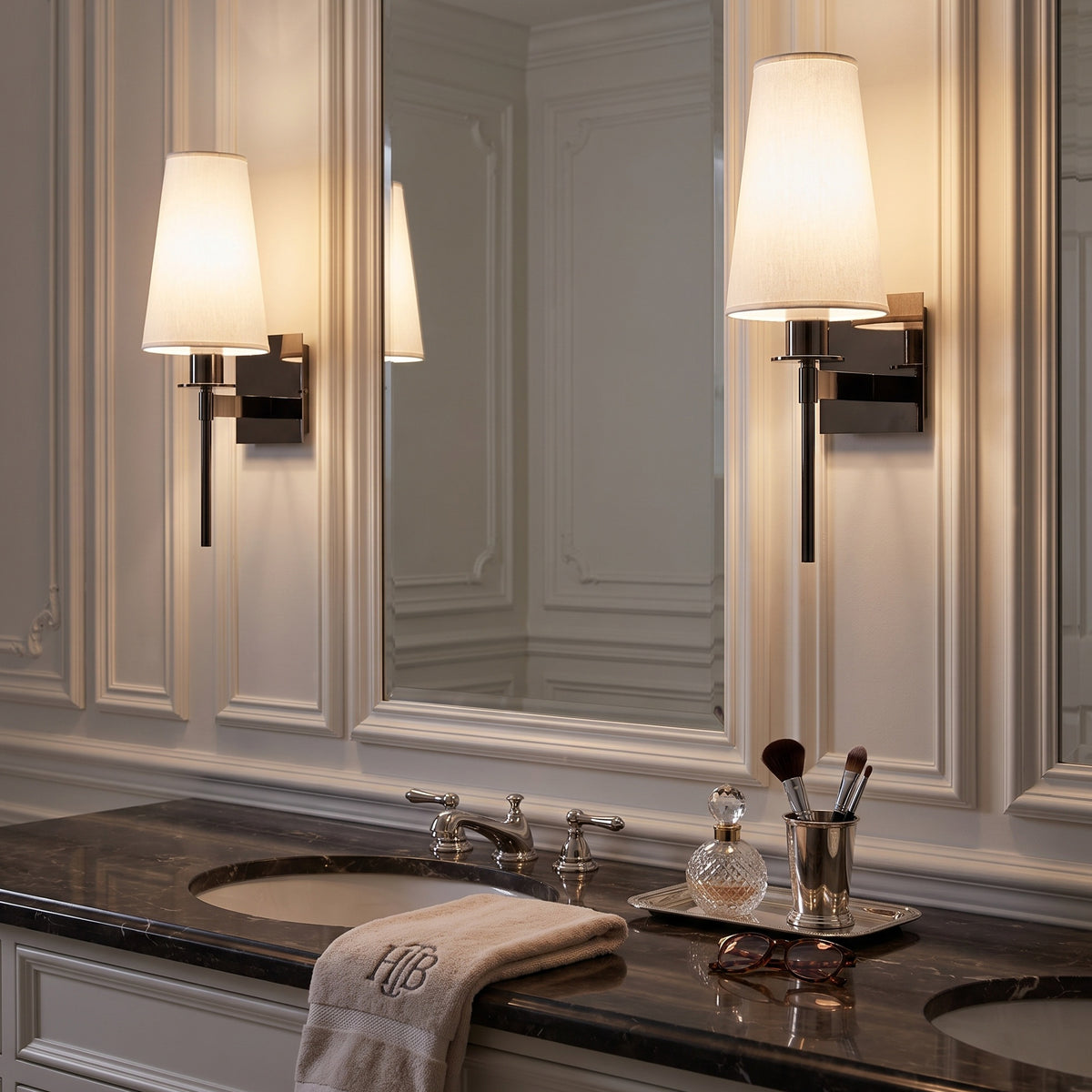 Boca Shaded Wall Sconces in Blackened Polished Nickel at a bathroom vanity